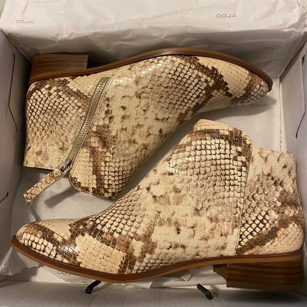 Brand new snake skin booties from Also-never worn.